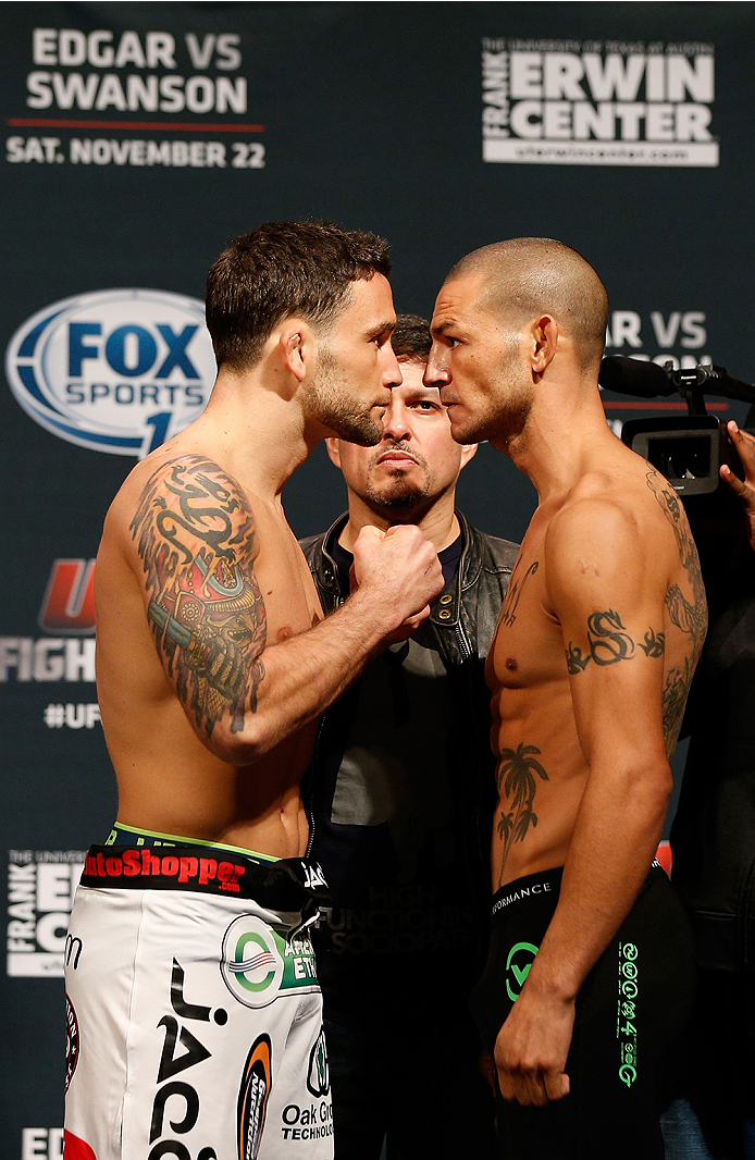 AUSTIN, TX - NOVEMBER 21:  (L-R) Opponents Frankie Edgar and Cub Swanson face off during the UFC weigh-in at The Frank Erwin Center on November 21, 2014 in Austin, Texas.  (Photo by Josh Hedges/Zuffa LLC/Zuffa LLC via Getty Images)