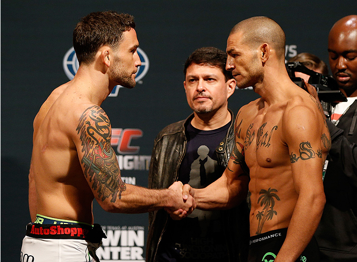AUSTIN, TX - NOVEMBER 21: (L-R) Opponents Frankie Edgar and Cub Swanson shake hands during the UFC weigh-in at The Frank Erwin Center on November 21, 2014 in Austin, Texas. (Photo by Josh Hedges/Zuffa LLC/Zuffa LLC via Getty Images)