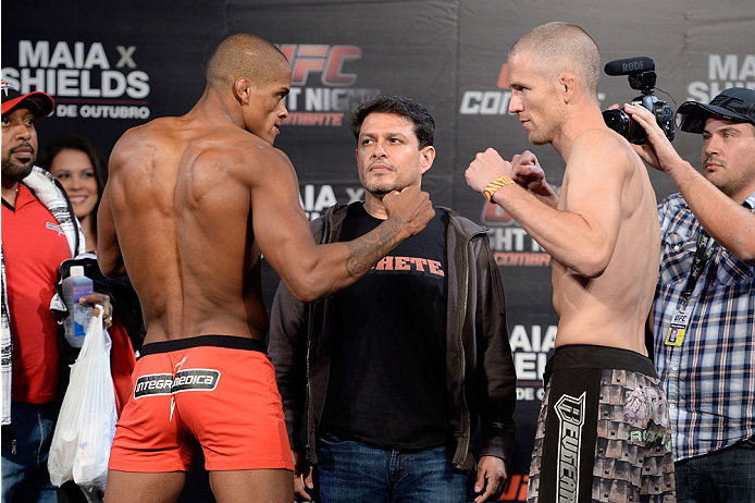 BARUERI, BRAZIL - OCTOBER 8:  (L-R) Alan Patrick and Garett Whiteley face off during the UFC Fight Night: Maia v Shields weigh-in at the Ginasio Jose Correa on October 8, 2013 in Barueri, Sao Paulo, Brazil. (Photo by Jeff Bottari/Zuffa LLC/Zuffa LLC via G