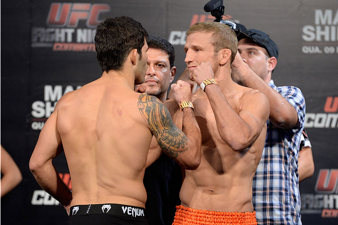 BARUERI, BRAZIL - OCTOBER 8:  (L-R) Rafael Assuncao and TJ Dillashaw face off during the UFC Fight Night: Maia v Shields weigh-in at the Ginasio Jose Correa on October 8, 2013 in Barueri, Sao Paulo, Brazil. (Photo by Jeff Bottari/Zuffa LLC/Zuffa LLC via G