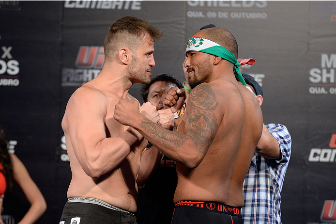 BARUERI, BRAZIL - OCTOBER 8:  (L-R) Fabio Maldonado and Joey Beltran face off during the UFC Fight Night: Maia v Shields weigh-in at the Ginasio Jose Correa on October 8, 2013 in Barueri, Sao Paulo, Brazil. (Photo by Jeff Bottari/Zuffa LLC/Zuffa LLC via G