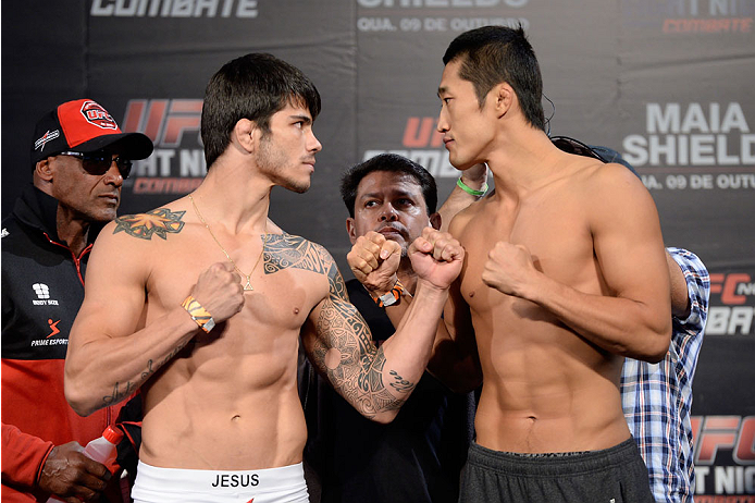 BARUERI, BRAZIL - OCTOBER 8:  (L-R) Erick Silva and Dong Hyun Kim face off during the UFC Fight Night: Maia v Shields weigh-in at the Ginasio Jose Correa on October 8, 2013 in Barueri, Sao Paulo, Brazil. (Photo by Jeff Bottari/Zuffa LLC/Zuffa LLC via Gett