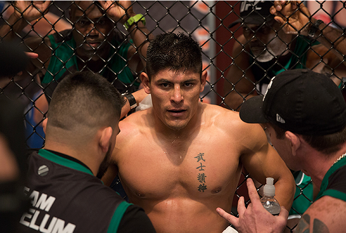 LAS VEGAS, NV - APRIL 10: Hector Aldana receives advice from his corner while facing Alvaro Herrera during the filming of The Ultimate Fighter Latin America: Team Gastelum vs Team Escudero on April 10, 2015 in Las Vegas, Nevada. (Photo by Brandon Magnu