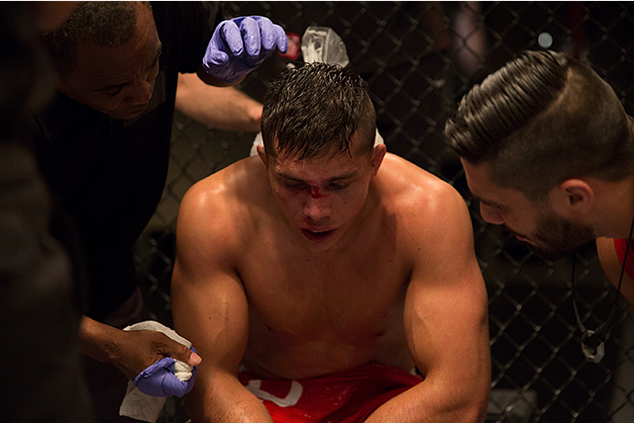 LAS VEGAS, NV - APRIL 10: Alvaro Herrera receives advice from his corner while facing Hector Aldana during the filming of The Ultimate Fighter Latin America: Team Gastelum vs Team Escudero on April 10, 2015 in Las Vegas, Nevada. (Photo by Brandon Magnus