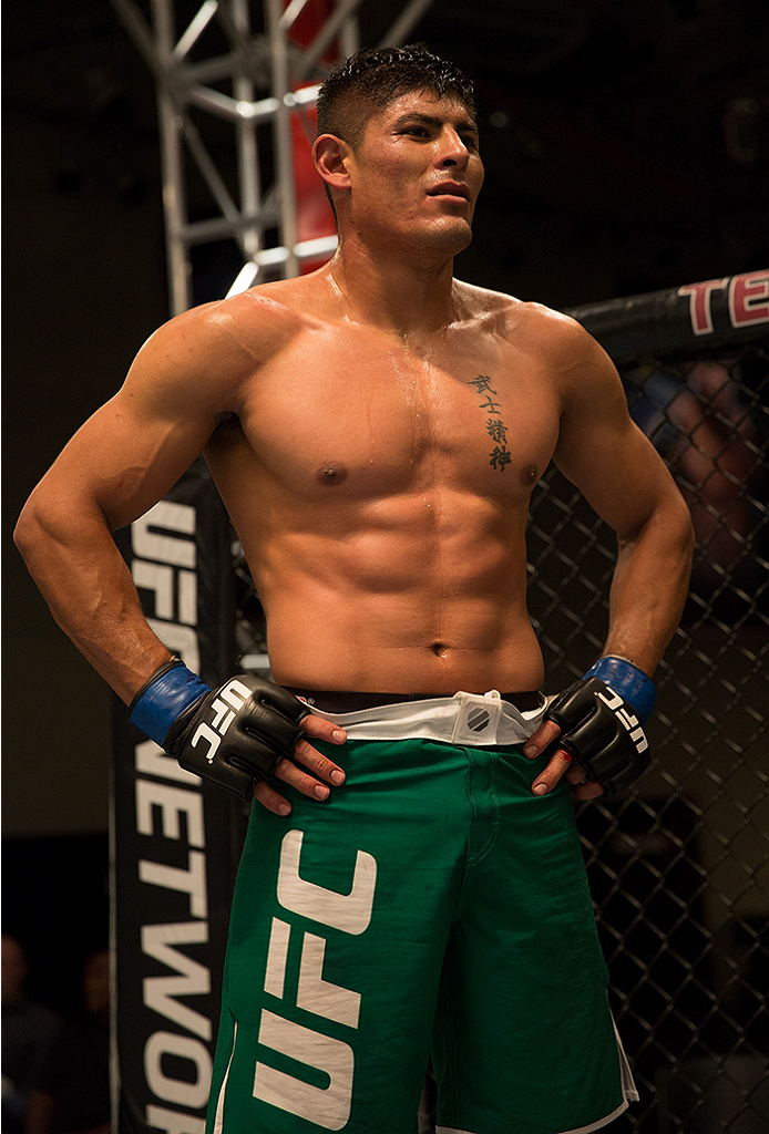 LAS VEGAS, NV - APRIL 10: Hector Aldana celebrates his victory over Alvaro Herrera during the filming of The Ultimate Fighter Latin America: Team Gastelum vs Team Escudero on April 10, 2015 in Las Vegas, Nevada. (Photo by Brandon Magnus/Zuffa LLC/Zuffa