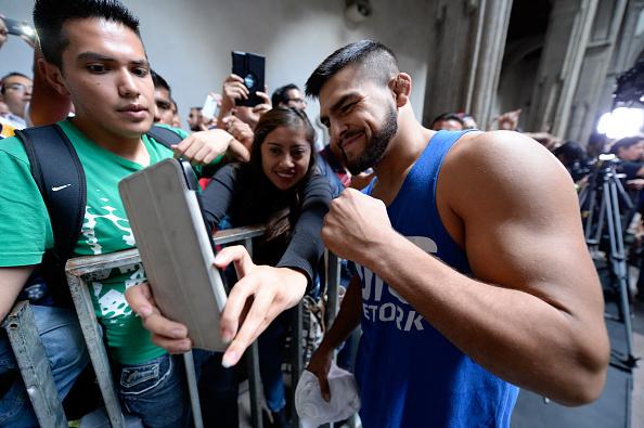 MEXICO CITY, MEXICO - NOVEMBER 12: Kelvin Gastelum interacts with fans during the UFC 180 open workouts at the Interactive Museum of Economics on November 12, 2014 in Mexico City, Mexico. (Photo by Jeff Bottari/Zuffa LLC/Zuffa LLC via Getty Images)