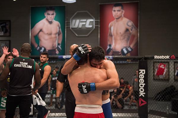 LAS VEGAS, NV - APRIL 21: Erick Monta–o hugs Vernon Ramos after their semi-finals fight during the filming of The Ultimate Fighter Latin America: Team Gastelum vs Team Escudero on April 21, 2015 in Las Vegas, Nevada. (Photo by Brandon Magnus/Zuffa LLC/Zu