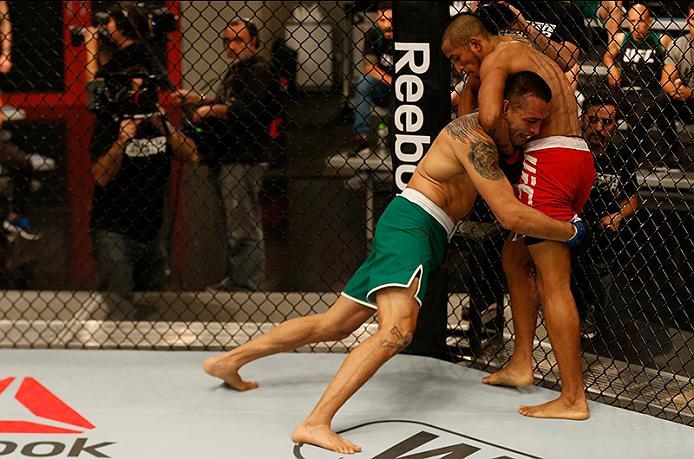 BUENOS AIRES, ARGENTINA - MAY 28: (L-R) Leonardo Rodriguez pushes Yasser Castillo up against the cage during the filming of The Ultimate Fighter Latin America: Team Liddell vs Team Griffin on May 28, 2016 in Buenos Aires, Argentina. (Photo by Gabriel Ros