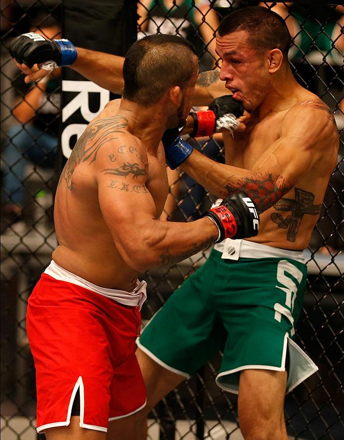 BUENOS AIRES, ARGENTINA - MAY 28: (L-R) Yasser Castillo punches Leonardo Rodriguez during the filming of The Ultimate Fighter Latin America: Team Liddell vs Team Griffin on May 28, 2016 in Buenos Aires, Argentina. (Photo by Gabriel Rossi/Zuffa LLC/Zuffa