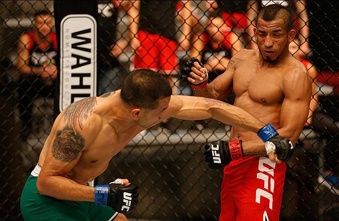 BUENOS AIRES, ARGENTINA - MAY 28: (L-R) Leonardo Rodriguez punches Yasser Castillo during the filming of The Ultimate Fighter Latin America: Team Liddell vs Team Griffin on May 28, 2016 in Buenos Aires, Argentina. (Photo by Gabriel Rossi/Zuffa LLC/Zuffa