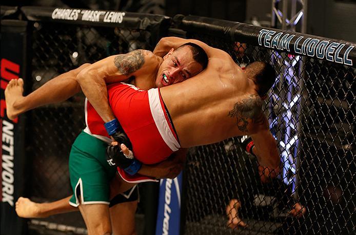 BUENOS AIRES, ARGENTINA - MAY 28: (L-R) Leonardo Rodriguez takes down Yasser Castillo during the filming of The Ultimate Fighter Latin America: Team Liddell vs Team Griffin on May 28, 2016 in Buenos Aires, Argentina. (Photo by Gabriel Rossi/Zuffa LLC/Zuf