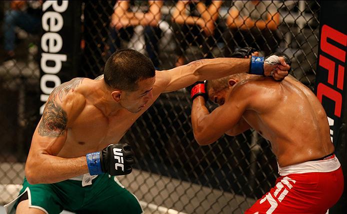 BUENOS AIRES, ARGENTINA - MAY 28: (L-R) Leonardo Rodriguez punches Yasser Castillo during the filming of The Ultimate Fighter Latin America: Team Liddell vs Team Griffin on May 28, 2016 in Buenos Aires, Argentina. (Photo by Gabriel Rossi/Zuffa LLC/Zuffa