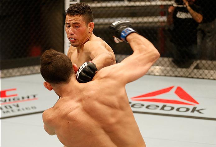BUENOS AIRES, ARGENTINA - MAY 28: (R-L) Martin Bravo punches Javier Ganin during the filming of The Ultimate Fighter Latin America: Team Liddell vs Team Griffin on May 28, 2016 in Buenos Aires, Argentina. (Photo by Gabriel Rossi/Zuffa LLC/Zuffa LLC via G