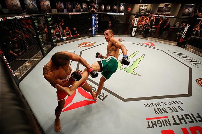 BUENOS AIRES, ARGENTINA - MAY 28: (R-L) Leonardo Rodriguez kicks Yasser Castillo during the filming of The Ultimate Fighter Latin America: Team Liddell vs Team Griffin on May 28, 2016 in Buenos Aires, Argentina. (Photo by Gabriel Rossi/Zuffa LLC/Zuffa LL