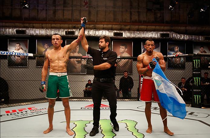 BUENOS AIRES, ARGENTINA - MAY 28: (L-R) Leonardo Rodriguez celebrates his victory over Yasser Castillo during the filming of The Ultimate Fighter Latin America: Team Liddell vs Team Griffin on May 28, 2016 in Buenos Aires, Argentina. (Photo by Gabriel Ro