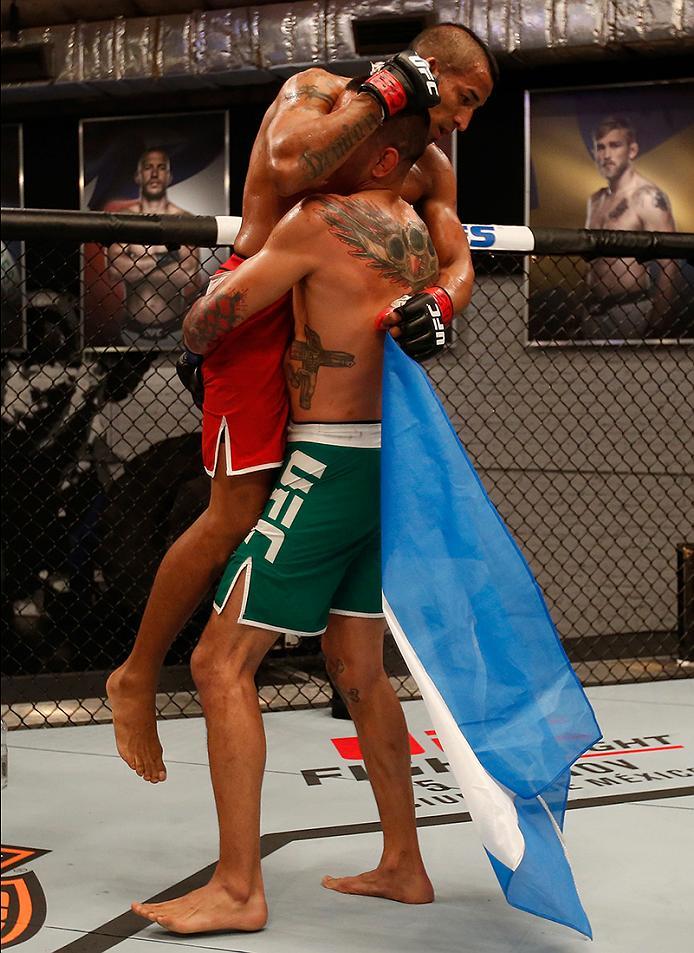 BUENOS AIRES, ARGENTINA - MAY 28: (R-L) Leonardo Rodriguez hugs Yasser Castillo during the filming of The Ultimate Fighter Latin America: Team Liddell vs Team Griffin on May 28, 2016 in Buenos Aires, Argentina. (Photo by Gabriel Rossi/Zuffa LLC/Zuffa LLC