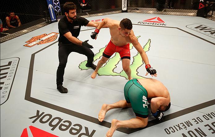 BUENOS AIRES, ARGENTINA - MAY 28: (L-R) Martin Bravo drops Javier Ganin during the filming of The Ultimate Fighter Latin America: Team Liddell vs Team Griffin on May 28, 2016 in Buenos Aires, Argentina. (Photo by Gabriel Rossi/Zuffa LLC/Zuffa LLC via Get