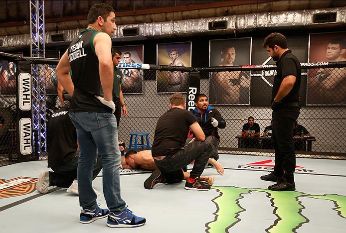 BUENOS AIRES, ARGENTINA - MAY 28: Javier Ganin lays on the ground in pain after facing Martin Bravo during the filming of The Ultimate Fighter Latin America: Team Liddell vs Team Griffin on May 28, 2016 in Buenos Aires, Argentina. (Photo by Gabriel Rossi