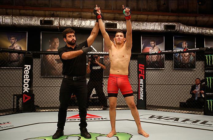 BUENOS AIRES, ARGENTINA - MAY 28: Martin Bravo celebrates his victory over Javier Ganin during the filming of The Ultimate Fighter Latin America: Team Liddell vs Team Griffin on May 28, 2016 in Buenos Aires, Argentina. (Photo by Gabriel Rossi/Zuffa LLC/Z