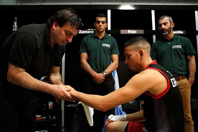 BUENOS AIRES, ARGENTINA - JUNE 4: Martin Bravo gets his hands wrapped before facing Ilianovich Chalo during the filming of The Ultimate Fighter Latin America: Team Liddell vs Team Griffin on June 4, 2016 in Buenos Aires, Argentina. (Photo by Gabriel Ross