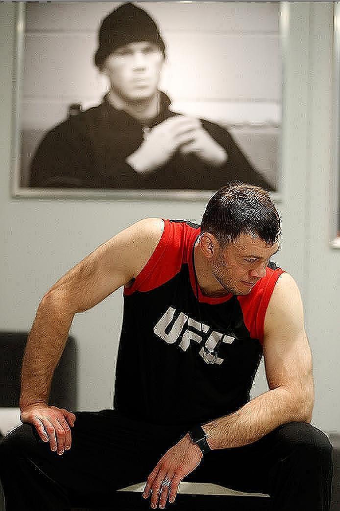 BUENOS AIRES, ARGENTINA - JUNE 4: Head coach Forrest Griffin watches as Martin Bravo gets his hands wrapped before facing Ilianovich Chalo during the filming of The Ultimate Fighter Latin America: Team Liddell vs Team Griffin on June 4, 2016 in Buenos Ai