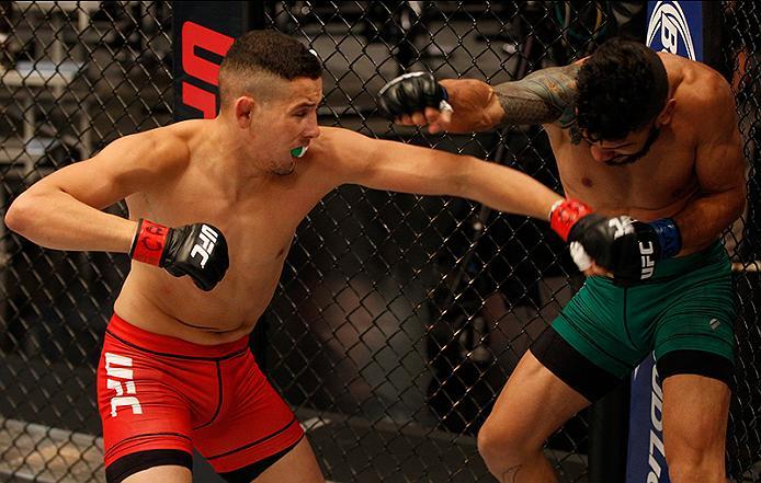 BUENOS AIRES, ARGENTINA - JUNE 4: (L-R) Martin Bravo punches Ilianovich Chalo during the filming of The Ultimate Fighter Latin America: Team Liddell vs Team Griffin on June 4, 2016 in Buenos Aires, Argentina. (Photo by Gabriel Rossi/Zuffa LLC/Zuffa LLC v