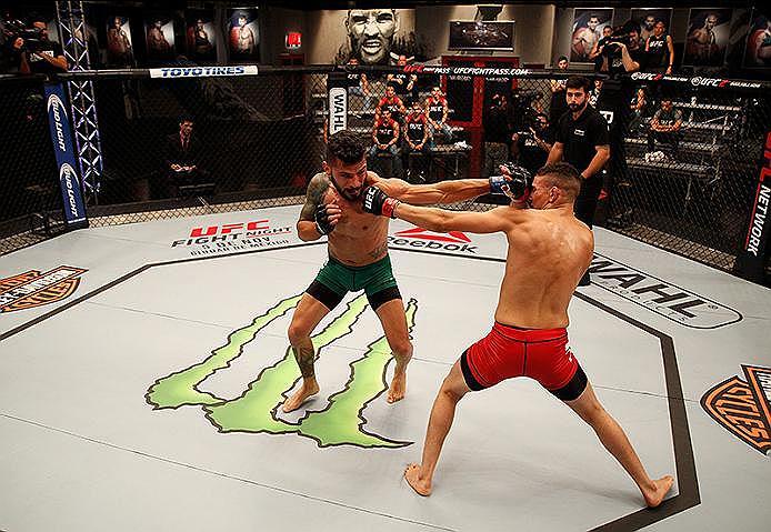 BUENOS AIRES, ARGENTINA - JUNE 4: (R-L) Martin Bravo exchanges punches with Ilianovich Chalo during the filming of The Ultimate Fighter Latin America: Team Liddell vs Team Griffin on June 4, 2016 in Buenos Aires, Argentina. (Photo by Gabriel Rossi/Zuffa