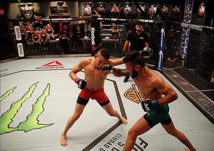 BUENOS AIRES, ARGENTINA - JUNE 4: (R-L) Ilianovich Chalo punches Martin Bravo during the filming of The Ultimate Fighter Latin America: Team Liddell vs Team Griffin on June 4, 2016 in Buenos Aires, Argentina. (Photo by Gabriel Rossi/Zuffa LLC/Zuffa LLC v