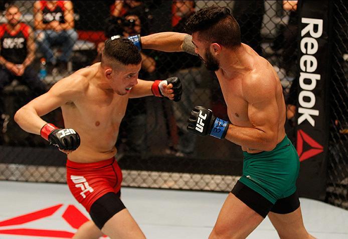 BUENOS AIRES, ARGENTINA - JUNE 4: (R-L) Ilianovich Chalo punches Martin Bravo during the filming of The Ultimate Fighter Latin America: Team Liddell vs Team Griffin on June 4, 2016 in Buenos Aires, Argentina. (Photo by Gabriel Rossi/Zuffa LLC/Zuffa LLC v