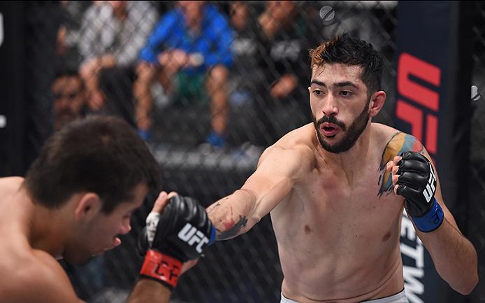 BUENOS AIRES, ARGENTINA - MAY 24: (R-L) John Bedoya punches Walter Zamora during the filming of The Ultimate Fighter Latin America: Team Liddell vs Team Griffin on May 24, 2016 in Buenos Aires, Argentina. (Photo by Amilcar Orfali/Zuffa LLC/Zuffa LLC via