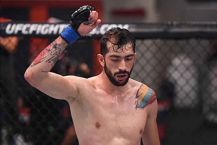 BUENOS AIRES, ARGENTINA - MAY 24: John Bedoya raises his hands after facing Walter Zamora during the filming of The Ultimate Fighter Latin America: Team Liddell vs Team Griffin on May 24, 2016 in Buenos Aires, Argentina. (Photo by Amilcar Orfali/Zuffa LL