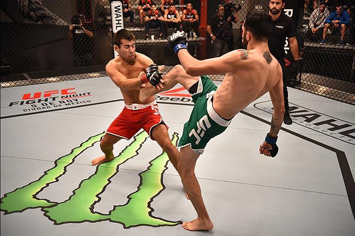 BUENOS AIRES, ARGENTINA - MAY 24: (R-L) John Bedoya kicks Walter Zamora during the filming of The Ultimate Fighter Latin America: Team Liddell vs Team Griffin on May 24, 2016 in Buenos Aires, Argentina. (Photo by Amilcar Orfali/Zuffa LLC/Zuffa LLC via Ge