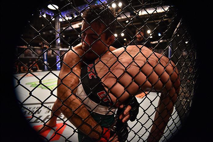 BUENOS AIRES, ARGENTINA - MAY 24: (L-R) Walter Zamora pushes John Bedoya up against the fence during the filming of The Ultimate Fighter Latin America: Team Liddell vs Team Griffin on May 24, 2016 in Buenos Aires, Argentina. (Photo by Amilcar Orfali/Zuff
