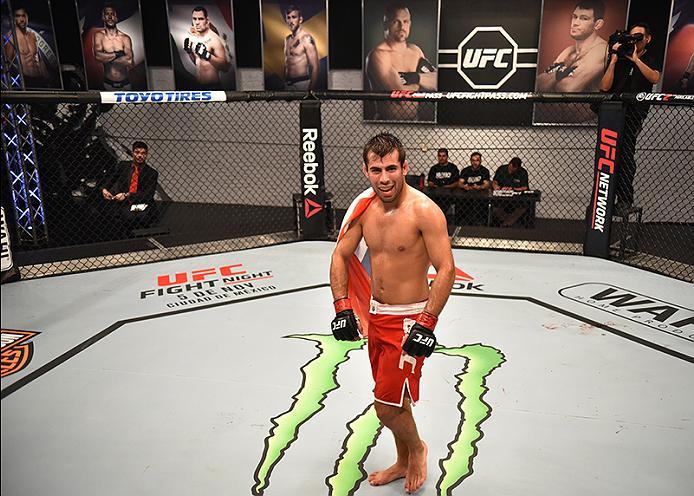 BUENOS AIRES, ARGENTINA - MAY 24: Walter Zamora celebrates his victory over John Bedoya during the filming of The Ultimate Fighter Latin America: Team Liddell vs Team Griffin on May 24, 2016 in Buenos Aires, Argentina. (Photo by Amilcar Orfali/Zuffa LLC/