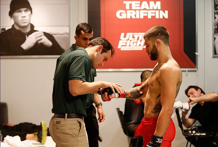 BUENOS AIRES, ARGENTINA - MAY 26: Marcelo Rojo puts his gloves on before facing Juan Villaseca during the filming of The Ultimate Fighter Latin America: Team Liddell vs Team Griffin on May 26, 2016 in Buenos Aires, Argentina. (Photo by Gabriel Rossi/Zuff