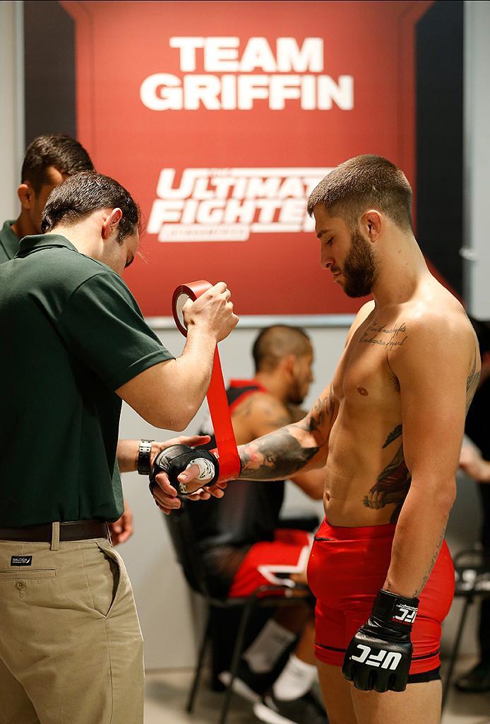 BUENOS AIRES, ARGENTINA - MAY 26: Marcelo Rojo puts his gloves on before facing Juan Villaseca during the filming of The Ultimate Fighter Latin America: Team Liddell vs Team Griffin on May 26, 2016 in Buenos Aires, Argentina. (Photo by Gabriel Rossi/Zuff