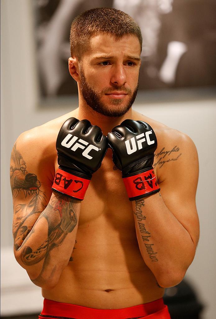 BUENOS AIRES, ARGENTINA - MAY 26: Marcelo Rojo puts his gloves on before facing Juan Villaseca during the filming of The Ultimate Fighter Latin America: Team Liddell vs Team Griffin on May 26, 2016 in Buenos Aires, Argentina. (Photo by Gabriel Rossi/Zuff