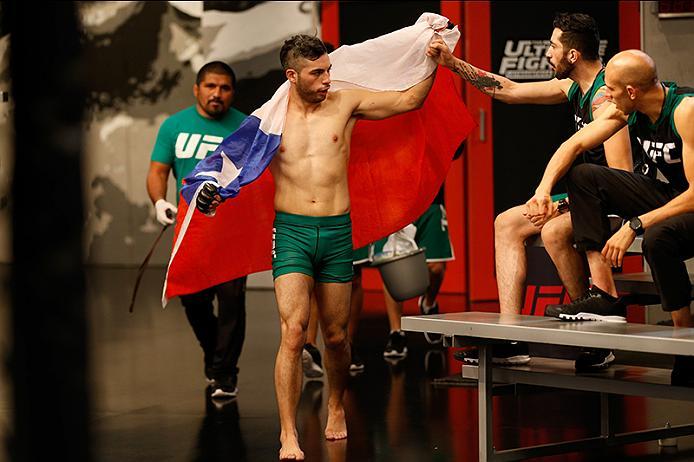 BUENOS AIRES, ARGENTINA - MAY 26: Juan Villaseca prepares to enter the Octagon before facing Marcelo Rojo during the filming of The Ultimate Fighter Latin America: Team Liddell vs Team Griffin on May 26, 2016 in Buenos Aires, Argentina. (Photo by Gabriel