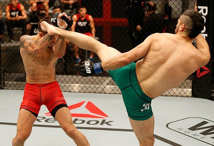 BUENOS AIRES, ARGENTINA - MAY 26: (R-L) Juan Villaseca kicks Marcelo Rojo during the filming of The Ultimate Fighter Latin America: Team Liddell vs Team Griffin on May 26, 2016 in Buenos Aires, Argentina. (Photo by Gabriel Rossi/Zuffa LLC/Zuffa LLC via G