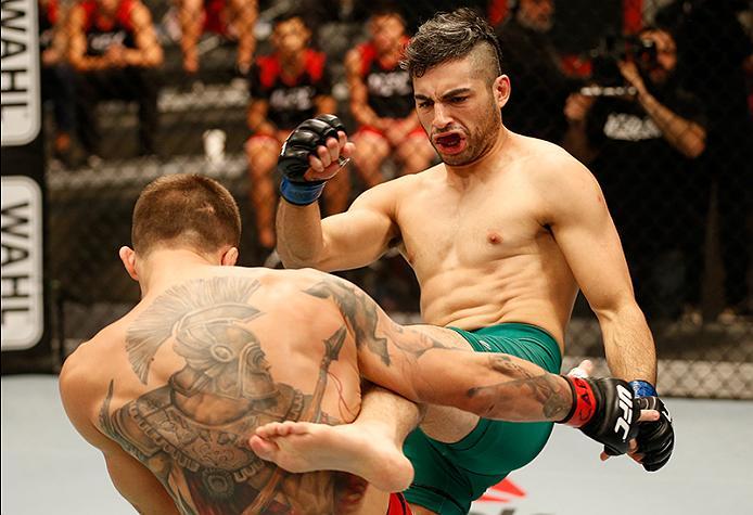 BUENOS AIRES, ARGENTINA - MAY 26: (R-L) Juan Villaseca kicks Marcelo Rojo during the filming of The Ultimate Fighter Latin America: Team Liddell vs Team Griffin on May 26, 2016 in Buenos Aires, Argentina. (Photo by Gabriel Rossi/Zuffa LLC/Zuffa LLC via G