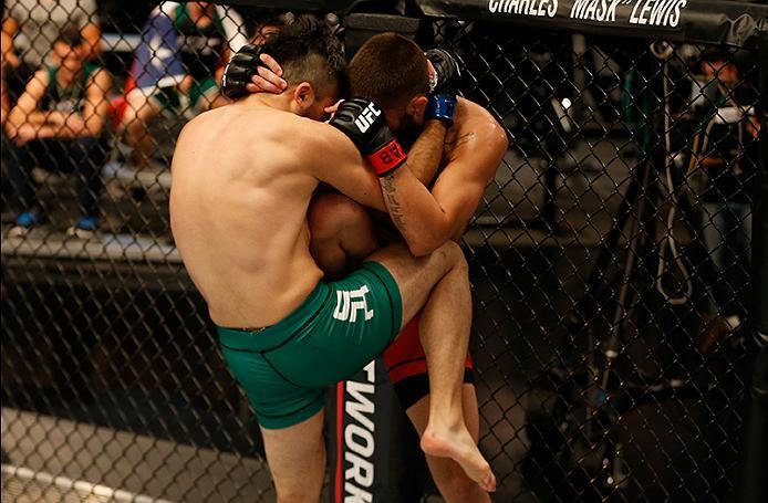 BUENOS AIRES, ARGENTINA - MAY 26: (L-R) Juan Villaseca knees Marcelo Rojo during the filming of The Ultimate Fighter Latin America: Team Liddell vs Team Griffin on May 26, 2016 in Buenos Aires, Argentina. (Photo by Gabriel Rossi/Zuffa LLC/Zuffa LLC via G