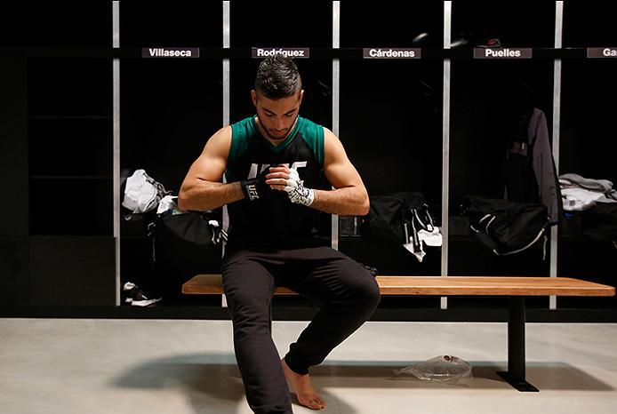 BUENOS AIRES, ARGENTINA - MAY 26: Juan Villaseca puts on his gloves before facing Marcelo Rojo during the filming of The Ultimate Fighter Latin America: Team Liddell vs Team Griffin on May 26, 2016 in Buenos Aires, Argentina. (Photo by Gabriel Rossi/Zuff