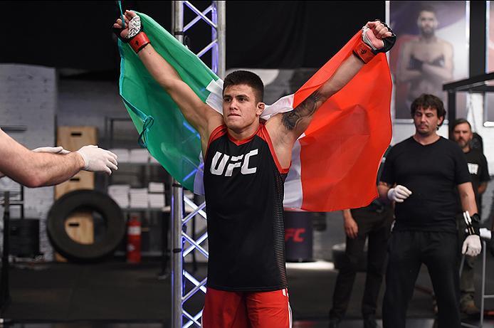 BUENOS AIRES, ARGENTINA - MAY 24: Miguel Villegas prepares to enter the Octagon before facing Ilianovich Chalo during the filming of The Ultimate Fighter Latin America: Team Liddell vs Team Griffin on May 24, 2016 in Buenos Aires, Argentina. (Photo by Am