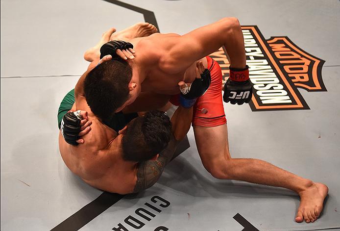 BUENOS AIRES, ARGENTINA - MAY 24: Miguel Villegas (top) punches Ilianovich Chalo during the filming of The Ultimate Fighter Latin America: Team Liddell vs Team Griffin on May 24, 2016 in Buenos Aires, Argentina. (Photo by Amilcar Orfali/Zuffa LLC/Zuffa L