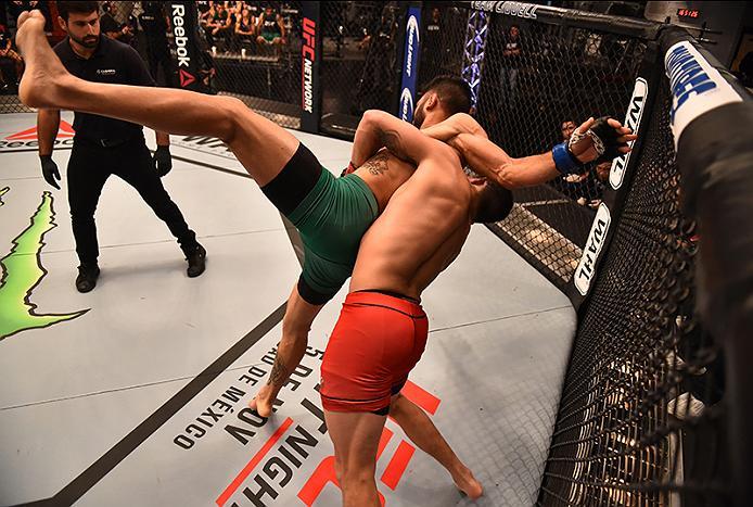 BUENOS AIRES, ARGENTINA - MAY 24: (R-L) Miguel Villegas takes down Ilianovich Chalo during the filming of The Ultimate Fighter Latin America: Team Liddell vs Team Griffin on May 24, 2016 in Buenos Aires, Argentina. (Photo by Amilcar Orfali/Zuffa LLC/Zuff