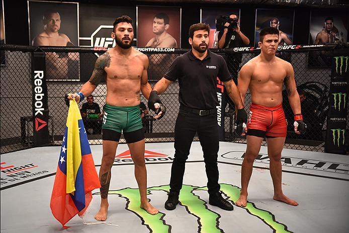 BUENOS AIRES, ARGENTINA - MAY 24: (L-R) Ilianovich Chalo celebrates his victory over Miguel Villegas during the filming of The Ultimate Fighter Latin America: Team Liddell vs Team Griffin on May 24, 2016 in Buenos Aires, Argentina. (Photo by Amilcar Orfa