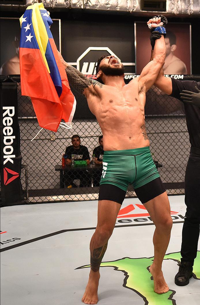 BUENOS AIRES, ARGENTINA - MAY 24: Ilianovich Chalo celebrates his victory over Miguel Villegas during the filming of The Ultimate Fighter Latin America: Team Liddell vs Team Griffin on May 24, 2016 in Buenos Aires, Argentina. (Photo by Amilcar Orfali/Zuf
