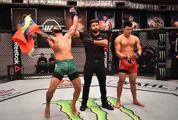 BUENOS AIRES, ARGENTINA - MAY 24: (L-R) Ilianovich Chalo celebrates his victory over Miguel Villegas during the filming of The Ultimate Fighter Latin America: Team Liddell vs Team Griffin on May 24, 2016 in Buenos Aires, Argentina. (Photo by Amilcar Orfa