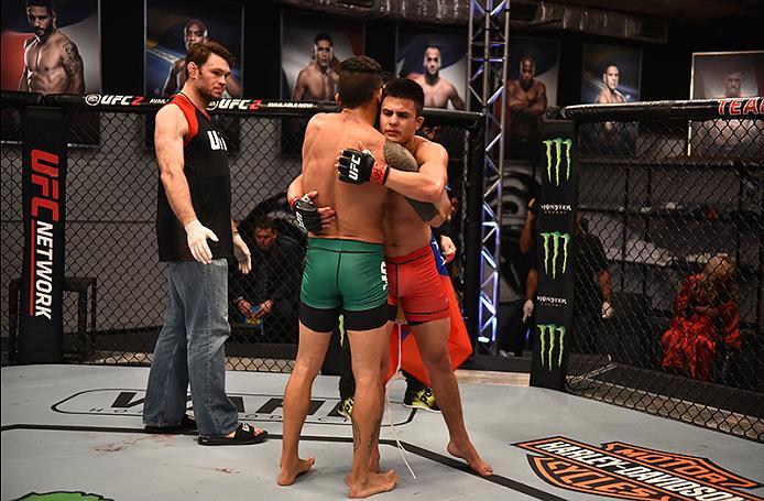 BUENOS AIRES, ARGENTINA - MAY 24: (L-R) Ilianovich Chalo hugs Miguel Villegas during the filming of The Ultimate Fighter Latin America: Team Liddell vs Team Griffin on May 24, 2016 in Buenos Aires, Argentina. (Photo by Amilcar Orfali/Zuffa LLC/Zuffa LLC
