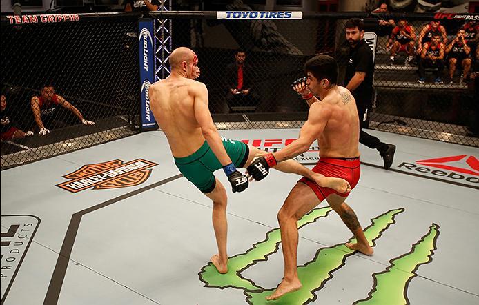 BUENOS AIRES, ARGENTINA - MAY 28: (L-R) Fabian Quintana kicks Alejandro Martinez during the filming of The Ultimate Fighter Latin America: Team Liddell vs Team Griffin on May 28, 2016 in Buenos Aires, Argentina. (Photo by Gabriel Rossi/Zuffa LLC/Zuffa LL
